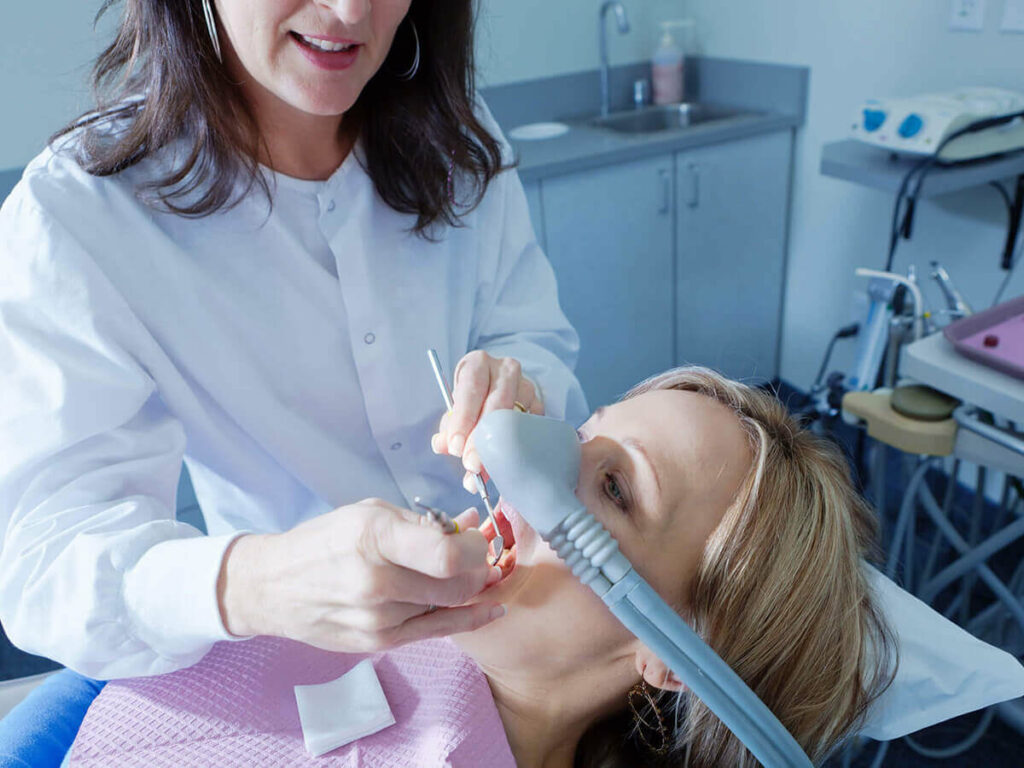 A patient receiving oral sedation at dentists office