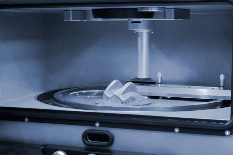 Inside the printing bed of a 3D dental printer